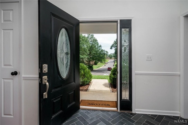 4410 Nicholas Ave, Northport, AL 35473 - entrance foyer featuring baseboards and dark tile patterned floors