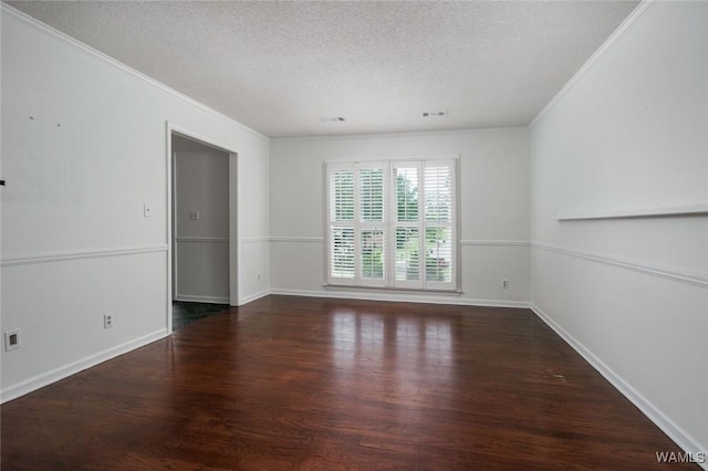 4410 Nicholas Ave, Northport, AL 35473 - spare room featuring crown molding, a textured ceiling, and wood finished floors