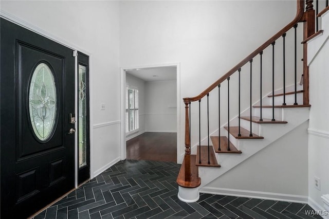 4410 Nicholas Ave, Northport, AL 35473 - foyer with stairway and a towering ceiling