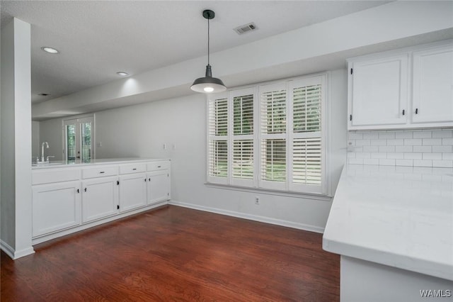 4410 Nicholas Ave, Northport, AL 35473 - unfurnished dining area featuring dark wood finished floors and recessed lighting