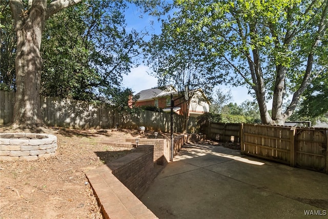 view of patio with an outdoor fire pit