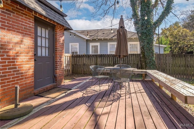 11 Audubon Pl, Tuscaloosa, AL 35401 - wooden terrace with outdoor dining space and fence