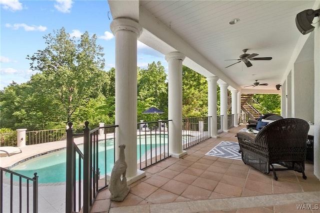 6821 Jade Pt, Tuscaloosa, AL 35406 - view of patio / terrace with ceiling fan and view of wooded area