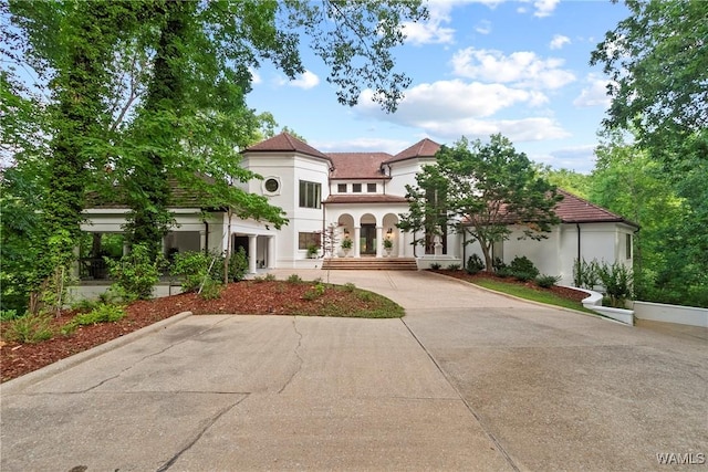 6821 Jade Pt, Tuscaloosa, AL 35406 - mediterranean / spanish-style home with stucco siding and driveway