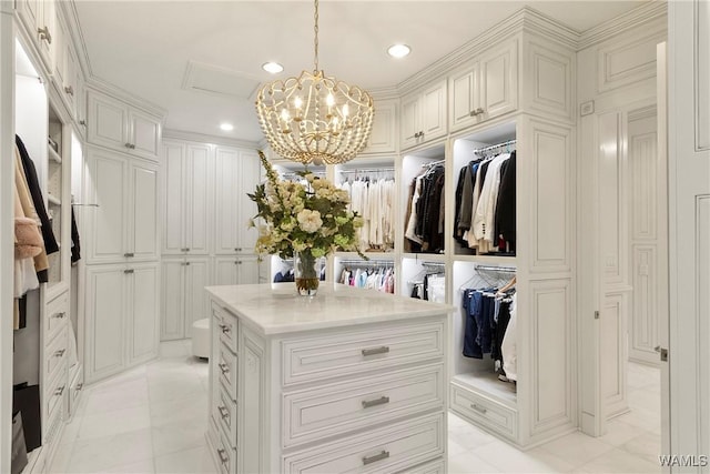 6821 Jade Pt, Tuscaloosa, AL 35406 - spacious closet with a chandelier and light marble finish floors