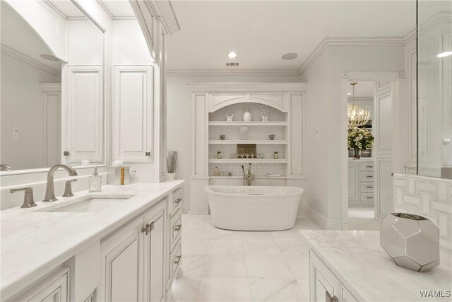 6821 Jade Pt, Tuscaloosa, AL 35406 - bathroom with vanity, a soaking tub, ornamental molding, marble finish flooring, and recessed lighting