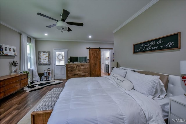 4402 Lakeshore Dr, Northport, AL 35473 - bedroom with a barn door, crown molding, wood finished floors, recessed lighting, and ceiling fan