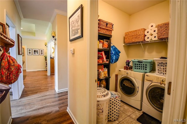 12464 Timberlane Rd, Ralph, AL 35480 - washroom with washing machine and dryer, baseboards, and wood finished floors