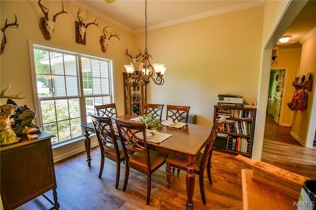 12464 Timberlane Rd, Ralph, AL 35480 - dining space with ornamental molding, wood finished floors, a chandelier, and baseboards