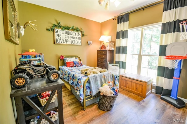 12464 Timberlane Rd, Ralph, AL 35480 - bedroom featuring wood finished floors