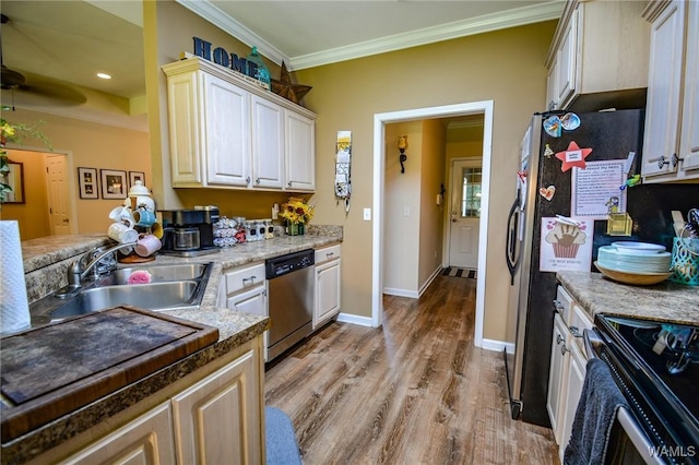 12464 Timberlane Rd, Ralph, AL 35480 - kitchen with stainless steel dishwasher, a sink, electric stove, light wood-type flooring, and ornamental molding