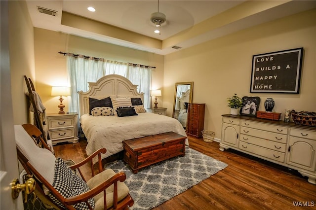 12464 Timberlane Rd, Ralph, AL 35480 - bedroom with a tray ceiling, dark wood finished floors, recessed lighting, baseboards, and a ceiling fan