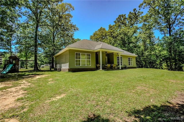 12464 Timberlane Rd, Ralph, AL 35480 - view of front facade with a playground and a front lawn