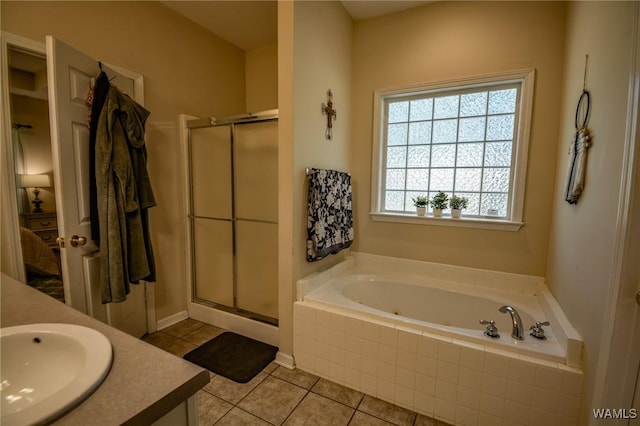 12464 Timberlane Rd, Ralph, AL 35480 - full bathroom with a tub with jets, a stall shower, tile patterned floors, and vanity