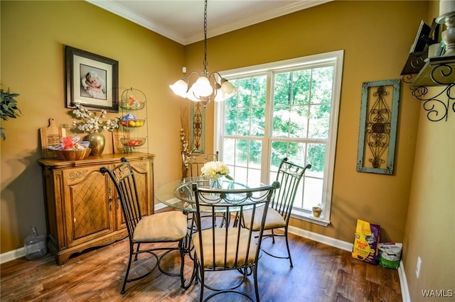 12464 Timberlane Rd, Ralph, AL 35480 - dining space with baseboards, healthy amount of natural light, ornamental molding, wood finished floors, and a chandelier