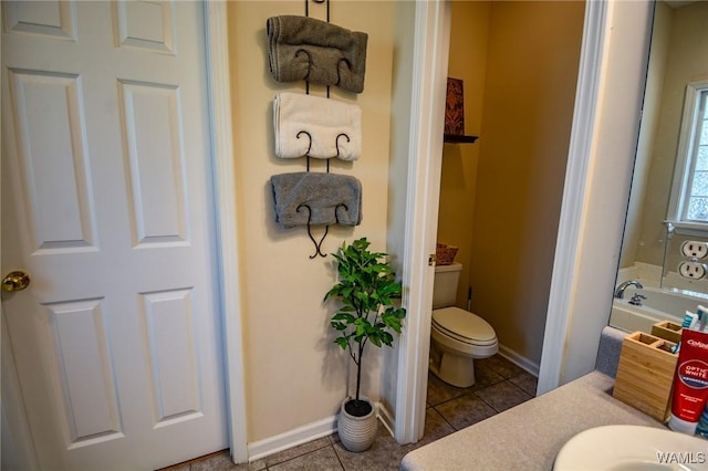 12464 Timberlane Rd, Ralph, AL 35480 - bathroom with toilet, tile patterned floors, baseboards, and vanity