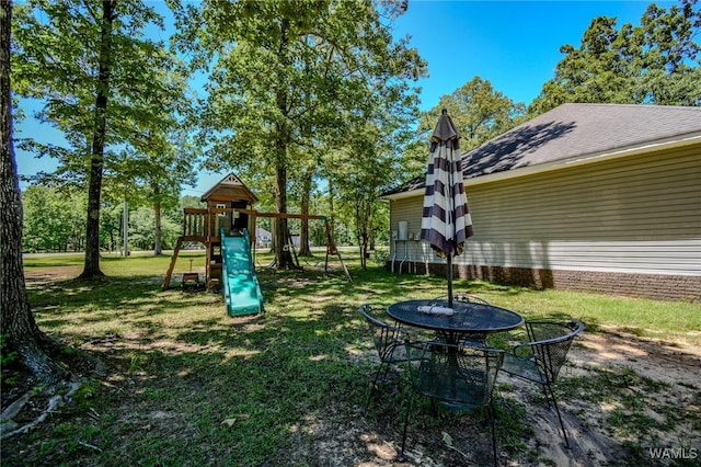 12464 Timberlane Rd, Ralph, AL 35480 - view of green lawn with a playground
