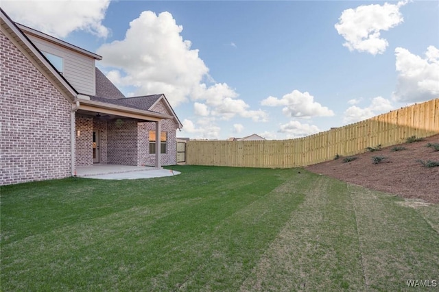 13713 Blackoak Dr, Northport, AL 35475 - view of yard with a fenced backyard and a patio