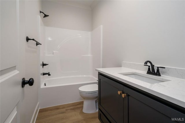 13713 Blackoak Dr, Northport, AL 35475 - bathroom featuring shower / bathing tub combination, vanity, toilet, and wood finished floors