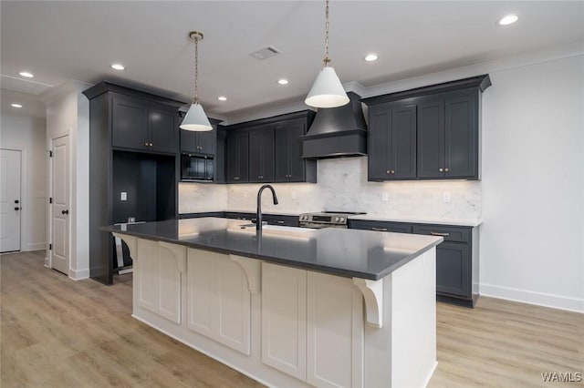 13713 Blackoak Dr, Northport, AL 35475 - kitchen with premium range hood, a sink, visible vents, light wood-style floors, and stainless steel range with electric stovetop