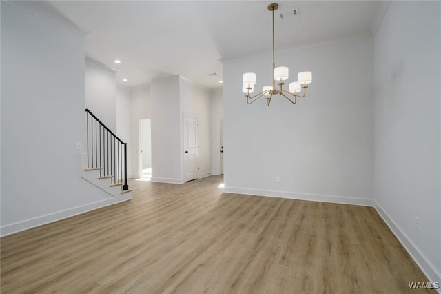 13713 Blackoak Dr, Northport, AL 35475 - empty room featuring light wood-type flooring, stairs, baseboards, and crown molding