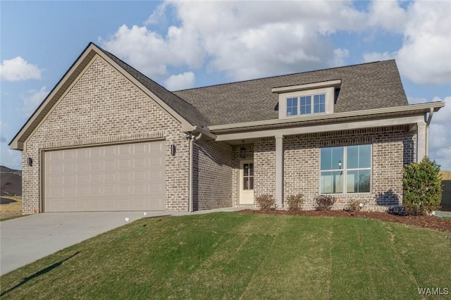 13713 Blackoak Dr, Northport, AL 35475 - view of front of property featuring driveway, roof with shingles, an attached garage, a front lawn, and brick siding