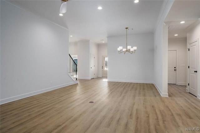 13713 Blackoak Dr, Northport, AL 35475 - unfurnished living room featuring light wood finished floors, recessed lighting, and baseboards