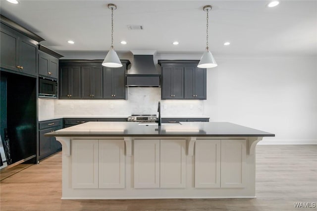 13713 Blackoak Dr, Northport, AL 35475 - kitchen with a sink, visible vents, black fridge, built in microwave, and wall chimney exhaust hood