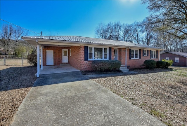 single story home with a carport