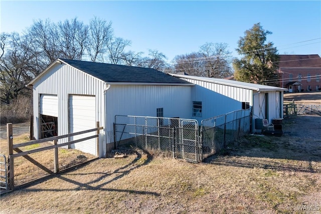 view of outbuilding featuring a garage