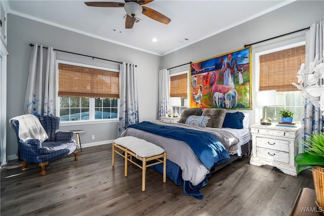 bedroom featuring dark hardwood / wood-style flooring, ornamental molding, and ceiling fan