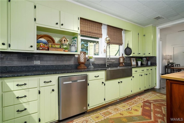 kitchen with sink, dark stone countertops, ornamental molding, decorative backsplash, and stainless steel dishwasher