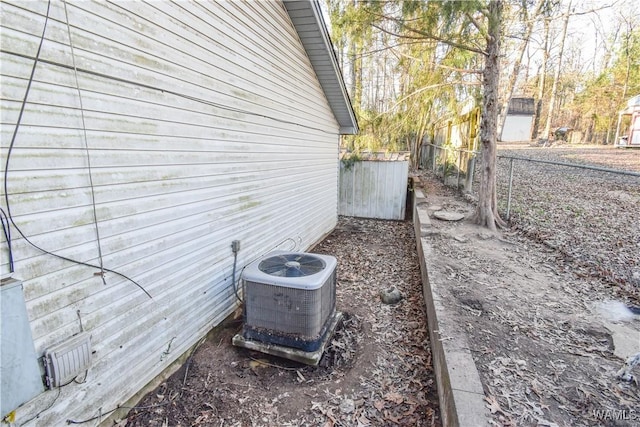 view of property exterior with cooling unit