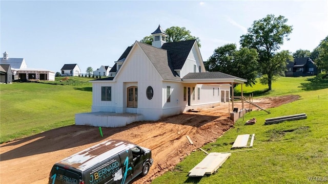 11332 Highland Lakes Pt, Northport, AL 35475 - view of front of house with roof with shingles and a front lawn