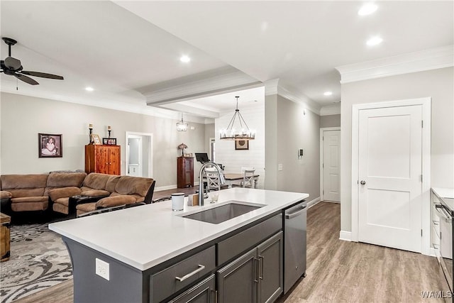 13901 Sullivan Blvd, Northport, AL 35475 - kitchen with a sink, stainless steel dishwasher, crown molding, open floor plan, and light wood-style floors