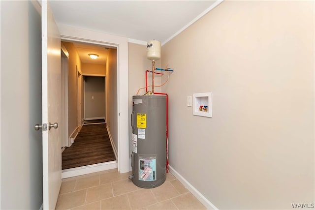 utility room featuring electric water heater