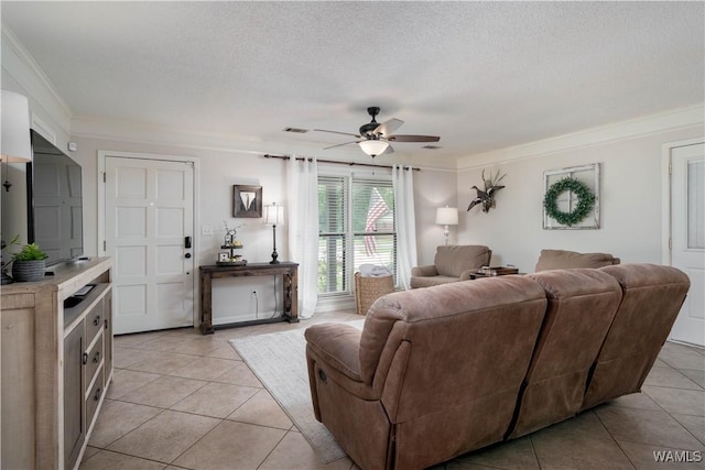 850 Walnut Dr, Tuscaloosa, AL 35405 - living room with light tile patterned floors, crown molding, a ceiling fan, and a textured ceiling