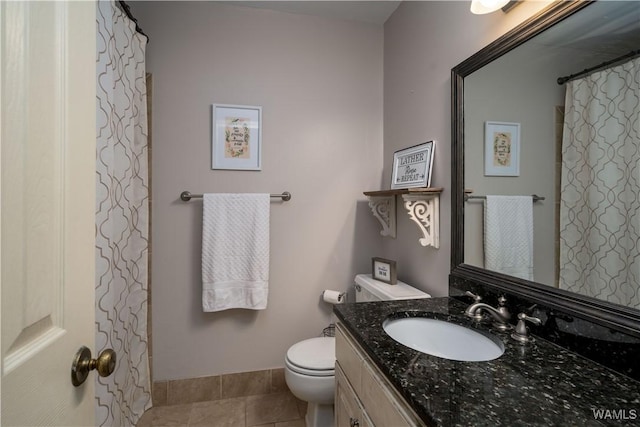 850 Walnut Dr, Tuscaloosa, AL 35405 - bathroom featuring toilet, vanity, and tile patterned floors
