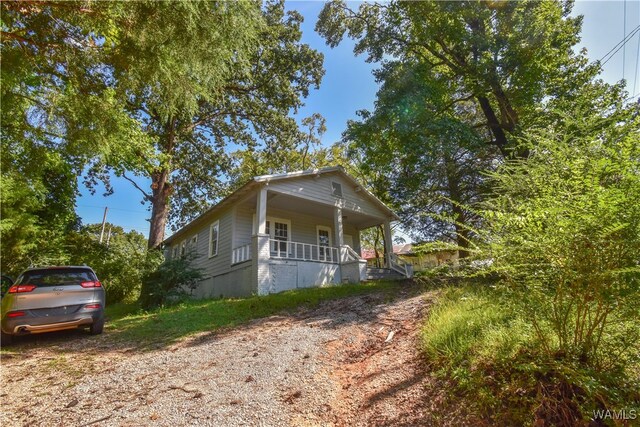 bungalow-style house featuring covered porch