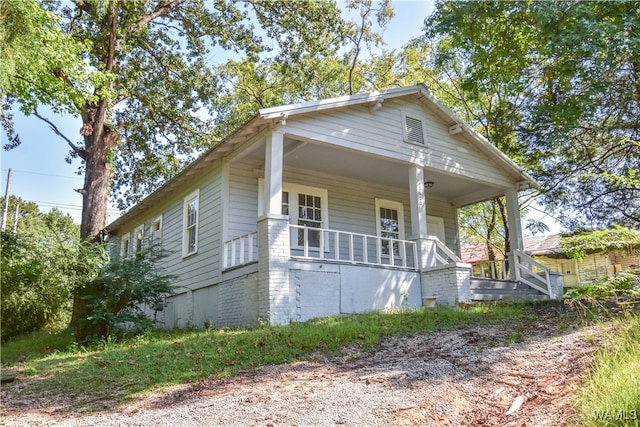 bungalow-style home featuring a porch