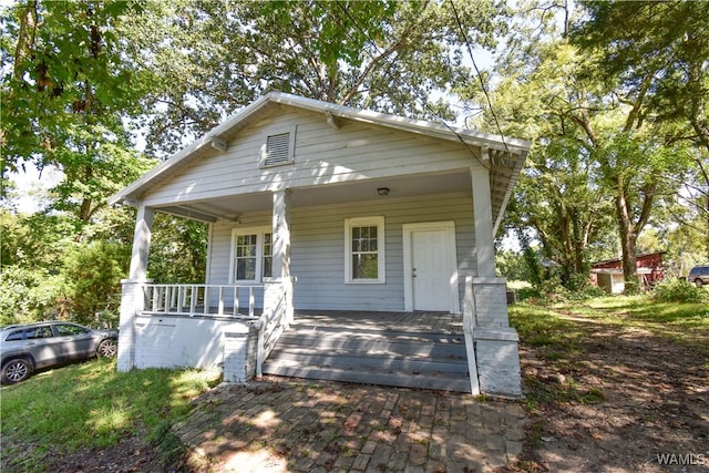 bungalow-style home featuring covered porch