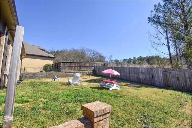 view of yard with fence