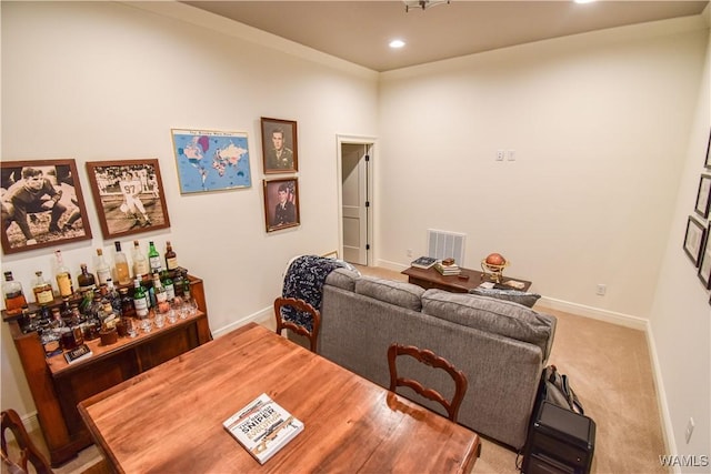 dining space with carpet floors, recessed lighting, visible vents, and baseboards