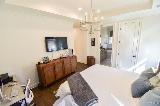 bedroom featuring dark wood-type flooring, a notable chandelier, and baseboards