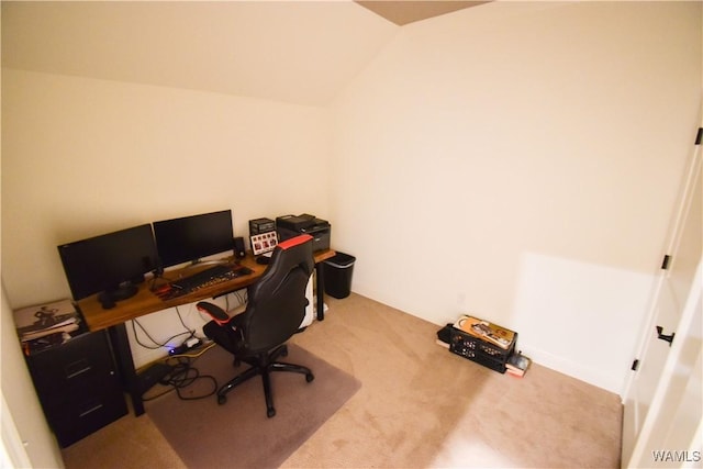 office space with carpet flooring and vaulted ceiling