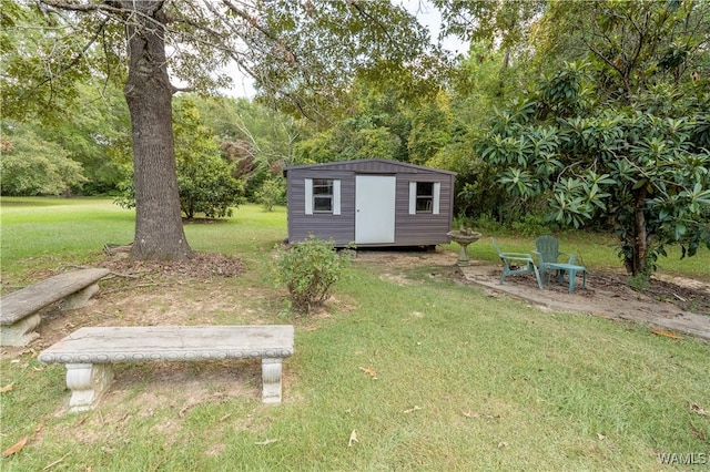 view of outdoor structure with a yard