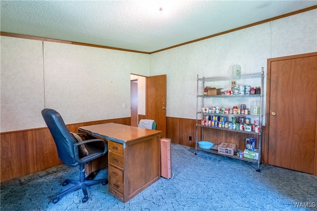 home office with crown molding, carpet floors, and a textured ceiling