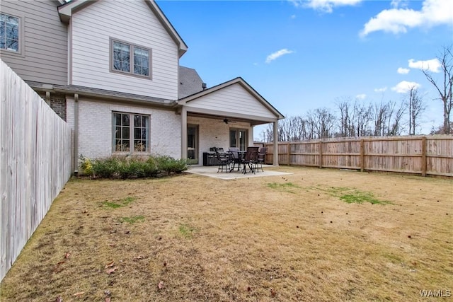 301 Trails End Ln, Tuscaloosa, AL 35406 - rear view of property with brick siding, a ceiling fan, and a fenced backyard