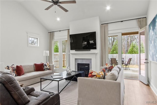 301 Trails End Ln, Tuscaloosa, AL 35406 - living area with vaulted ceiling, recessed lighting, light wood-style floors, a ceiling fan, and a fireplace