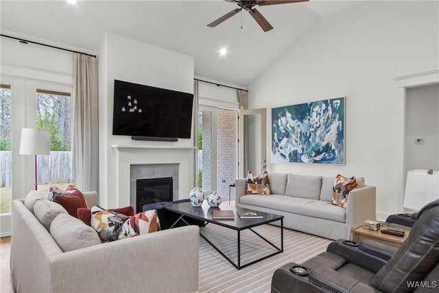 301 Trails End Ln, Tuscaloosa, AL 35406 - living room with high vaulted ceiling, wood finished floors, ceiling fan, a tile fireplace, and recessed lighting